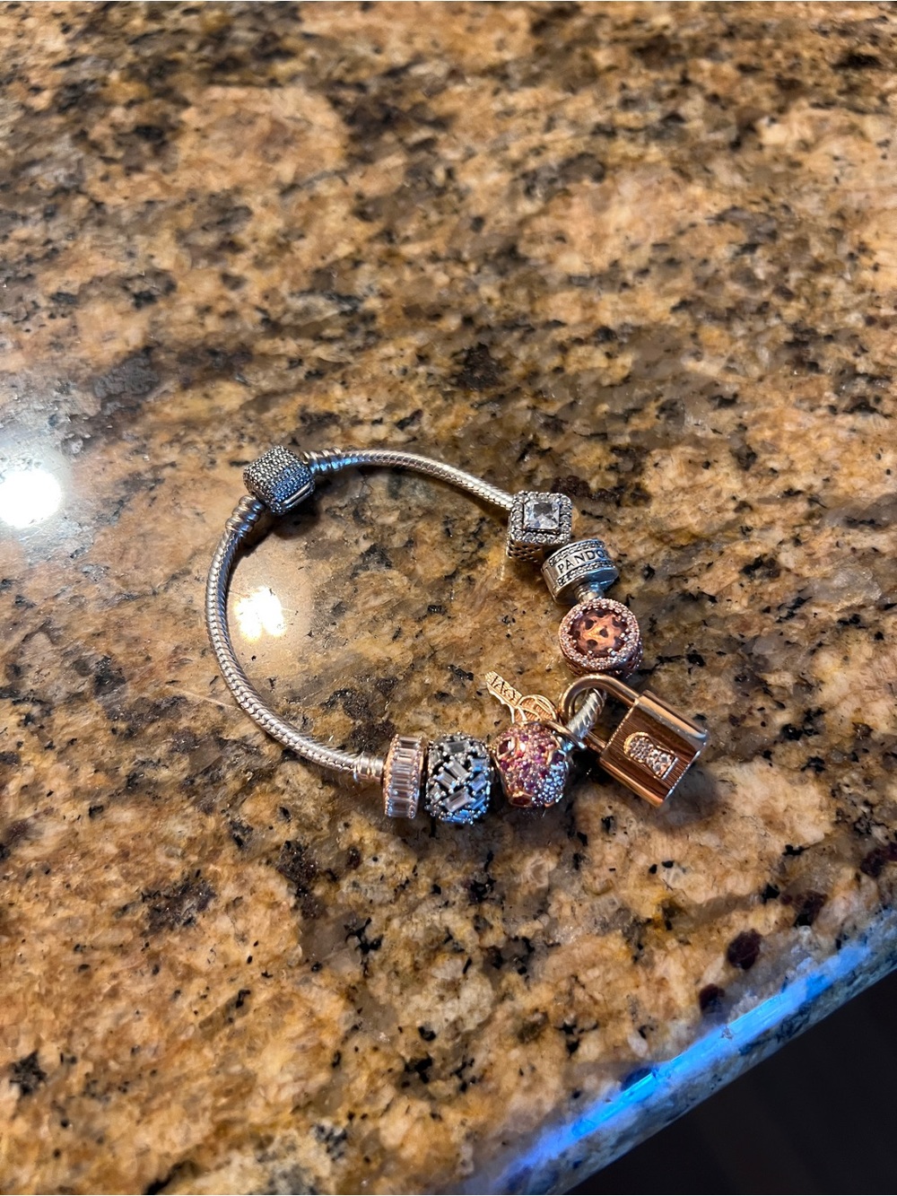 Pandora Silver and Rose Gold Charm Bracelet with Pink Accents